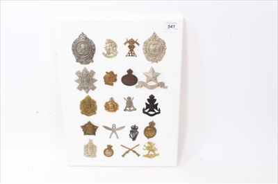 Lot 541 - Group of twenty cap badges, including Mine Clearance Service, Artists Rifles and Black Watch mounted on board