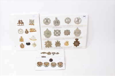 Lot 546 - Group of thirty two cap badges and sweetheart badges to include Essex Regiment, Highland Regiment and Cameron Highlanders (mounted on four boards)