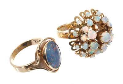 Lot 511 - Two opal dress rings