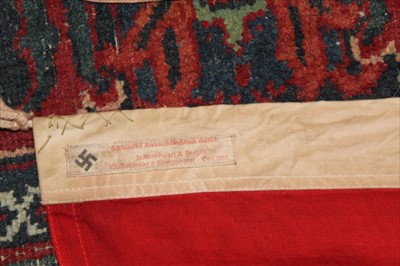 Lot 551 - Reproduction Second World War Nazi Battle Flag with makers label for Schornhosrt & Berger, stamped 90 x 150 (cm)