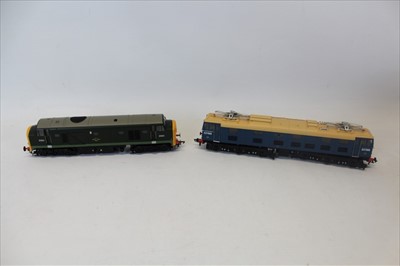 Lot 2715 - Railway Heljan 00 Gauge Class 23 Diesel locomotive D5903 in green livery with full yellow ends (2301) plus EM2 E27006 electric blue with half yellow panels (77061) both mint & boxed