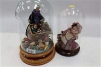 Lot 2781 - Pedler doll under glass dome and on ceramic...