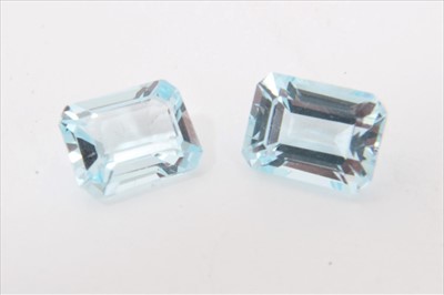 Lot 57 - Two unmounted blue topaz emerald cut stones