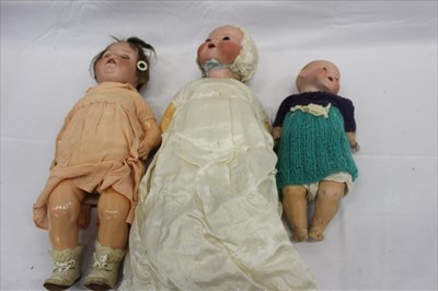 Lot 2755 - Three Amand Marseille Dolls including 990 A.4.M. bisque head doll, painted brows lashes and lip, open mouth top two teeth showing, composite body and limbs, small dream baby and large 351 3½K doll...