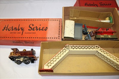 Lot 2785 - Railway Hornby 0 gauge MO locomotive boxed, No 1 Footbridge boxed, Signal boxed, LMS 0-4-0 locomotive and tender clockwork plus some wagons, track and lead figures of station staff and accessories