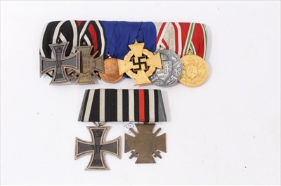 Lot 588 - First World War and later German Medal group, to include Imperial German Iron Cross (Second Class), First World War Honour Cross and Nazi Faithful Service Decoration (40 year) (mounted), together w...