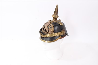 Lot 590 - Reproduction Imperial German Picklehaube helmet of leather construction with brass fittings