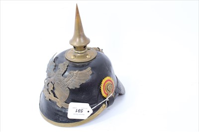 Lot 591 - Reproduction Imperial German Picklehaube helmet of leather construction with brass fittings