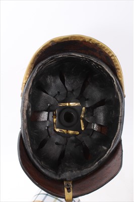 Lot 592 - Reproduction Imperial German Picklehaube helmet of leather construction with brass fittings