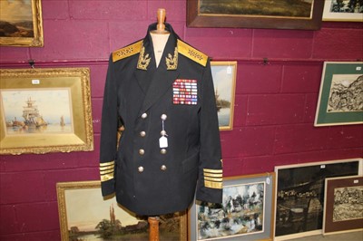 Lot 596 - Cold War Era Russian Admirals Uniform comprising jacket with mounted medal ribbons and insignia, together with trousers