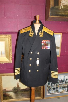 Lot 596 - Cold War Era Russian Admirals Uniform comprising jacket with mounted medal ribbons and insignia, together with trousers