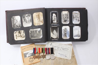 Lot 598 - Second World War Navy Medal group comprising 1939 - 1945 Star, Africa Star, Pacific Star, Defence and New Zealand War Service Medal (mounted on bar) together with service records and photograph alb...