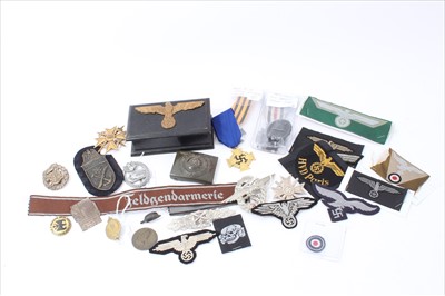 Lot 600 - Collection of replica Nazi medals, orders and decorations to include Spanish Cross, Narvik Shield and SS Belt Buckle together with cloth badges and other items