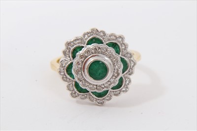 Lot 3308 - Gold 18ct emerald and diamond cluster ring