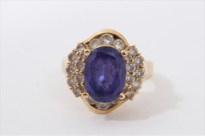 Lot 3313 - Gold 14ct blue topaz and diamond cluster ring