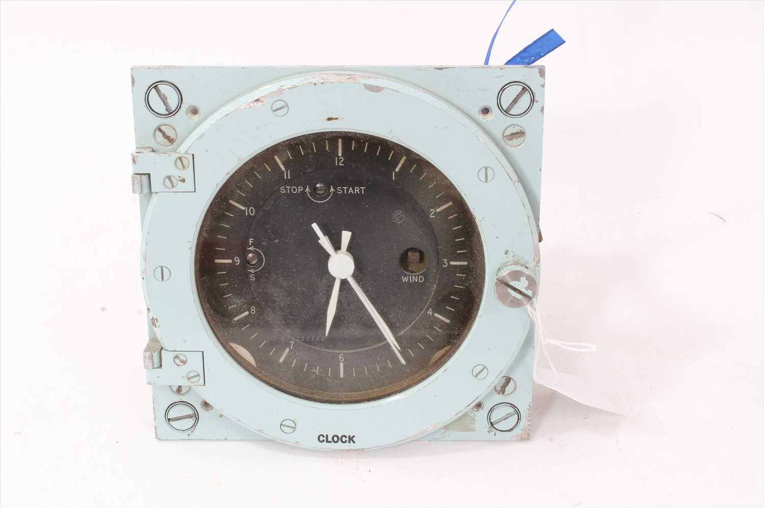 Lot 608 - Post War Marine / Navy Ships clock with black Arabic numerical dial and hinged glass cover, case in grey painted finish