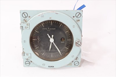 Lot 608 - Post War Marine / Navy Ships clock with black Arabic numerical dial and hinged glass cover, case in grey painted finish