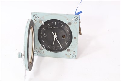 Lot 608 - Post War Marine / Navy Ships clock with black Arabic numerical dial and hinged glass cover, case in grey painted finish