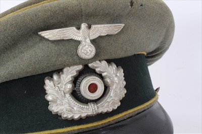Lot 545 - Second World War Nazi Wehrmacht Officers Cap, with yellow piping, and brown leather headband to interior stamped Deutsches Leder