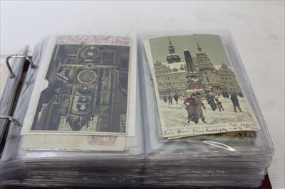 Lot 2637 - Postcards in album including early mechcanical clock, Gruss Aus, coloured vignettes, American cards, glamour and real photographic.