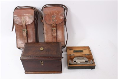 Lot 614 - Two First World War Period Brown leather ammounition bags, together with a wooden box with brass Machine Gun Corps Badge and other items