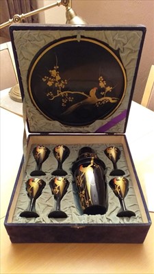 Lot 3659 - 1930's Japanese Black Lacquer Cocktail set, comprising cocktail shaker, tray and six glasses, with prunus and cockerel decoration, in fitted case