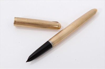 Lot 3411 - 1960s 9ct gold Parker “51” fountain pen with engine turned decoration and vacant cartouche, hallmarked London 1961