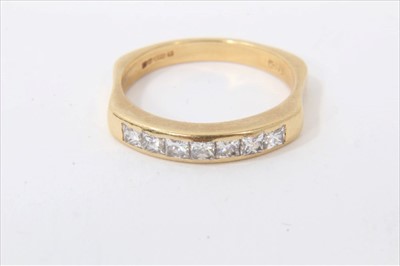Lot 240 - Princess cut diamond eternity ring