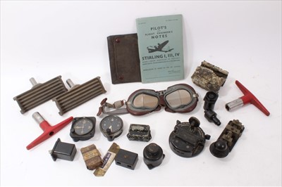 Lot 622 - Group of Second World War period aircraft clocks, together with flying goggles, Stirling Bomber Pilots and Engineers Notes book and other aircraft parts.