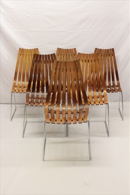 Lot 1280 - Set of six 1960s Hans Brattrud rosewood Scandia chairs, three with original labels