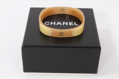 Lot 3351 - Vintage Chanel plastic bangle