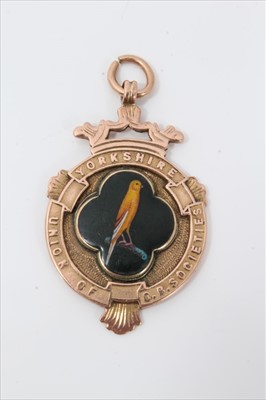 Lot 3717 - 9ct gold and enamelled canary fancier’s medal, Birmingham 1913