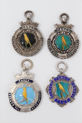 Lot 3719 - Group of four silver and enamelled canary fancier’s medals