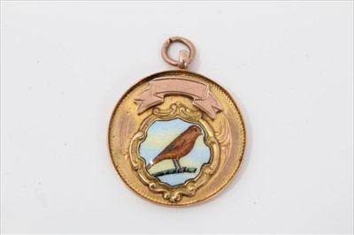 Lot 3722 - 9ct gold and enamelled canary fancier’s medal, Chester 1934