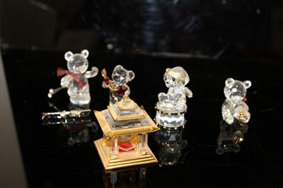 Lot 2160 - Swarovski Crystal 'Journeys' Pagoda ornament, boxed, along with four boxed Swarovski teddy bear ornaments (5)