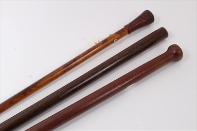 Lot 3693 - Late 19th century Malacca walking cane with baby crocodile leather carved handle and ivory eyelets together with another stick with inset 1891 penny and one other heavy stick with inset 1933 silver...