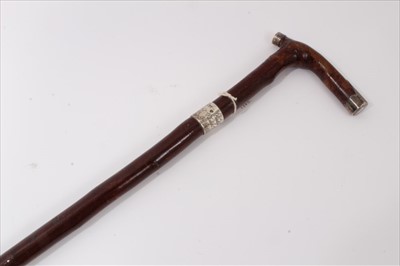 Lot 3686 - Victorian Cherry walking stick with silver collar engraved Violet Hemery from R.G. Lund 19 Feb 87 "Birdlip Tulips If not Vi not" (london 1885), integral crutch handle with silver end caps, 89cm ove...