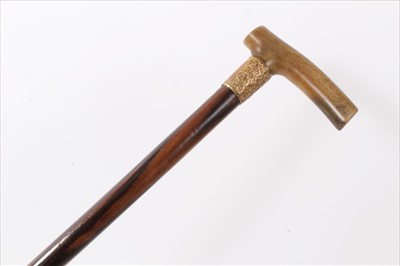 Lot 3679 - Late 19th/early 20th century Rosewood walking stick with gilt metal collar and Rhino Horn crutch handle, 77cm overall length