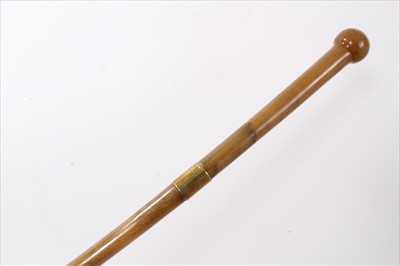 Lot 3673 - Late 19th/early 20th century Rhino Horn walking stick with metal collar and integral rondel handle, 77cm overall length