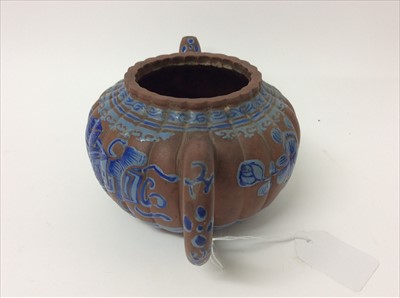 Lot 3736 - Three Chinese items 19th to 20th century, including Yixing teapot with blue enamel decoration and white enamel character marks, a carved wooden temple figure reputedly wahed up on the shore of a ri...