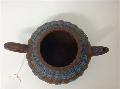 Lot 3736 - Three Chinese items 19th to 20th century, including Yixing teapot with blue enamel decoration and white enamel character marks, a carved wooden temple figure reputedly wahed up on the shore of a ri...