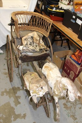 Lot 3847 - Rare Victorian Twin Wooden Horse Child's perambulator with wood and wicker seat.  Iron wheels and frame.