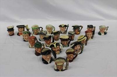 Lot 2177 - Twenty-three Royal Doulton character jugs including The Caroler D7007, Old Charley, Bacchus D6521 and The Lawyer D6524