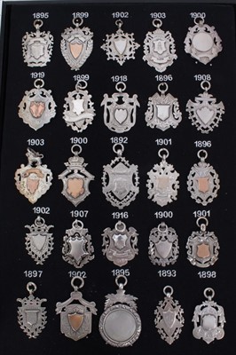 Lot 3379 - Collection twenty five Late Victorian and Edwardian silver watch fobs (25)