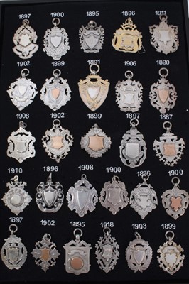 Lot 3380 - Collection twenty five Late Victorian and Edwardian silver watch fobs (25)