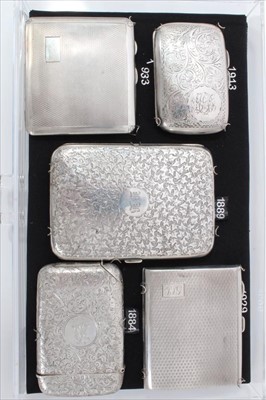 Lot 3383 - Two late Victorian silver cigarette cases with scroll engraved decoration and three other silver cigarette cases (5)