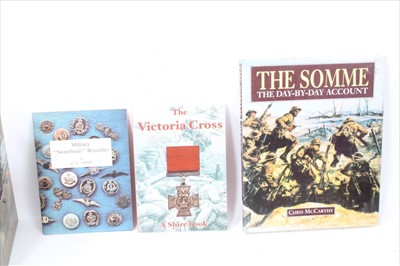 Lot 573 - Group of assorted militaria to include Military interest books, an old spear and Gulf War related items (qty)