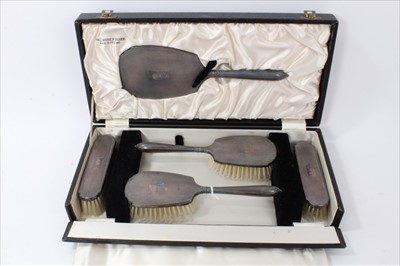 Lot 3427 - Five piece contemporary silver dressing table set.