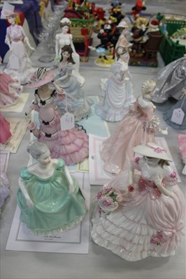 Lot 2186 - Collection of 8 Coalport porcelain figures of ladies, to include 'Rose Blossom', 'Meg', 'Charlotte - A Summer Stroll', 'Lillie Langtry', 'Madame de Pompadour', 'Sophie', 'Golden Age', and 'Henriett...