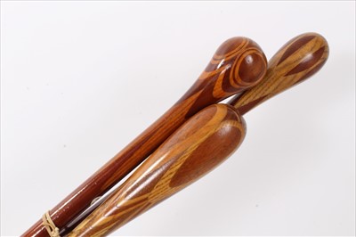 Lot 3698 - Three marquetry topped walking sticks of intricate design using different woods, varying lengths